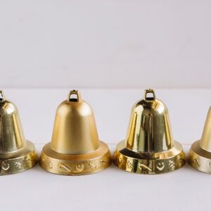 Four bells on table